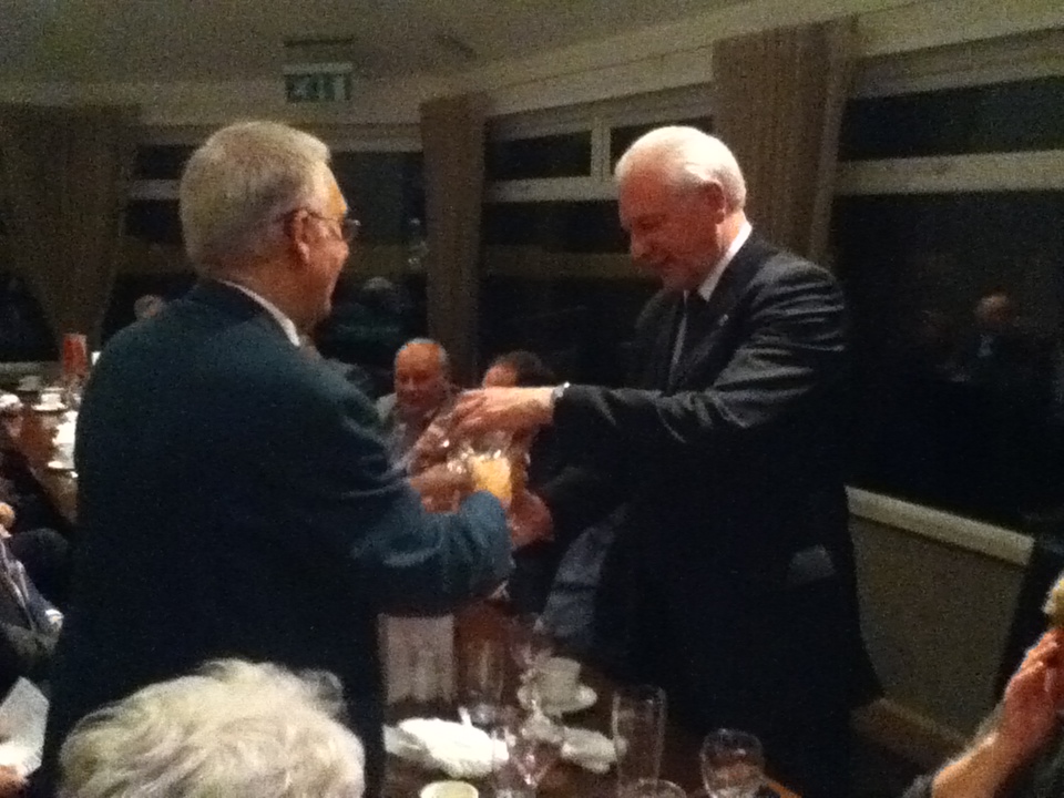 Presentation Night Chairman Terry Pateman handing over gift to his successor Mr Jim Shaw