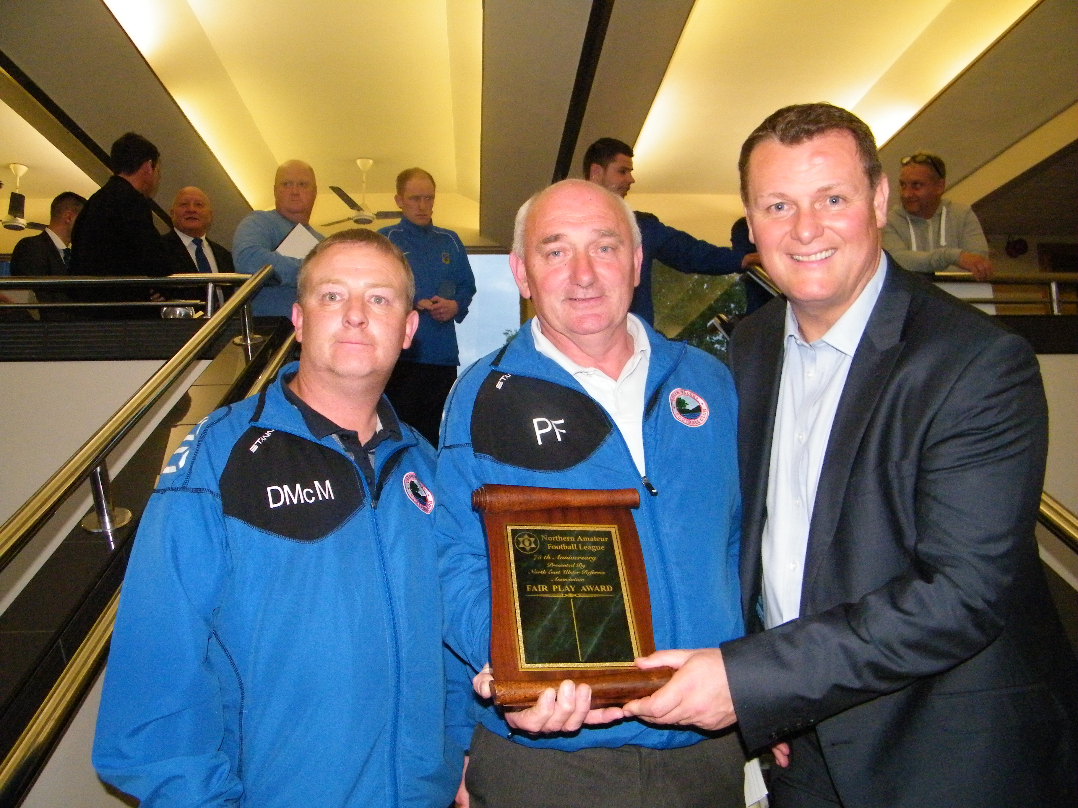 Colinvalley FC Paddy Fay & Danny McMullan receiving the Fair Play award from Jim Magilton